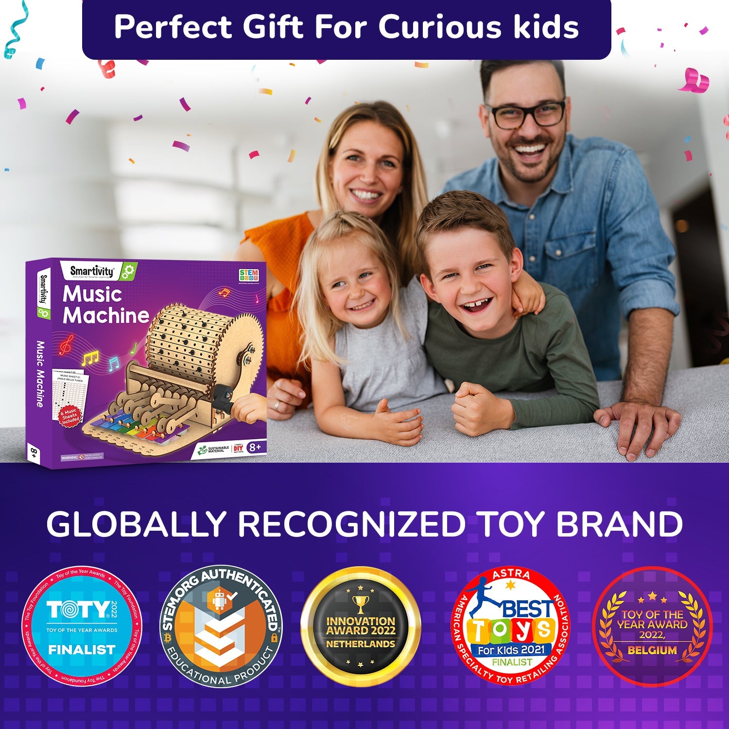 Family with children and a toy music machine box, with confetti and awards displayed.